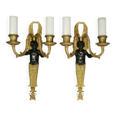 Pair of winged putti wall sconces in Louis XVI style - gilded bronze and black patina