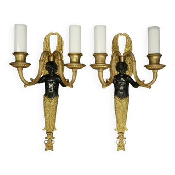 Pair of winged putti wall sconces in Louis XVI style - gilded bronze and black patina
