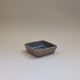 Stoneware pocket emptier