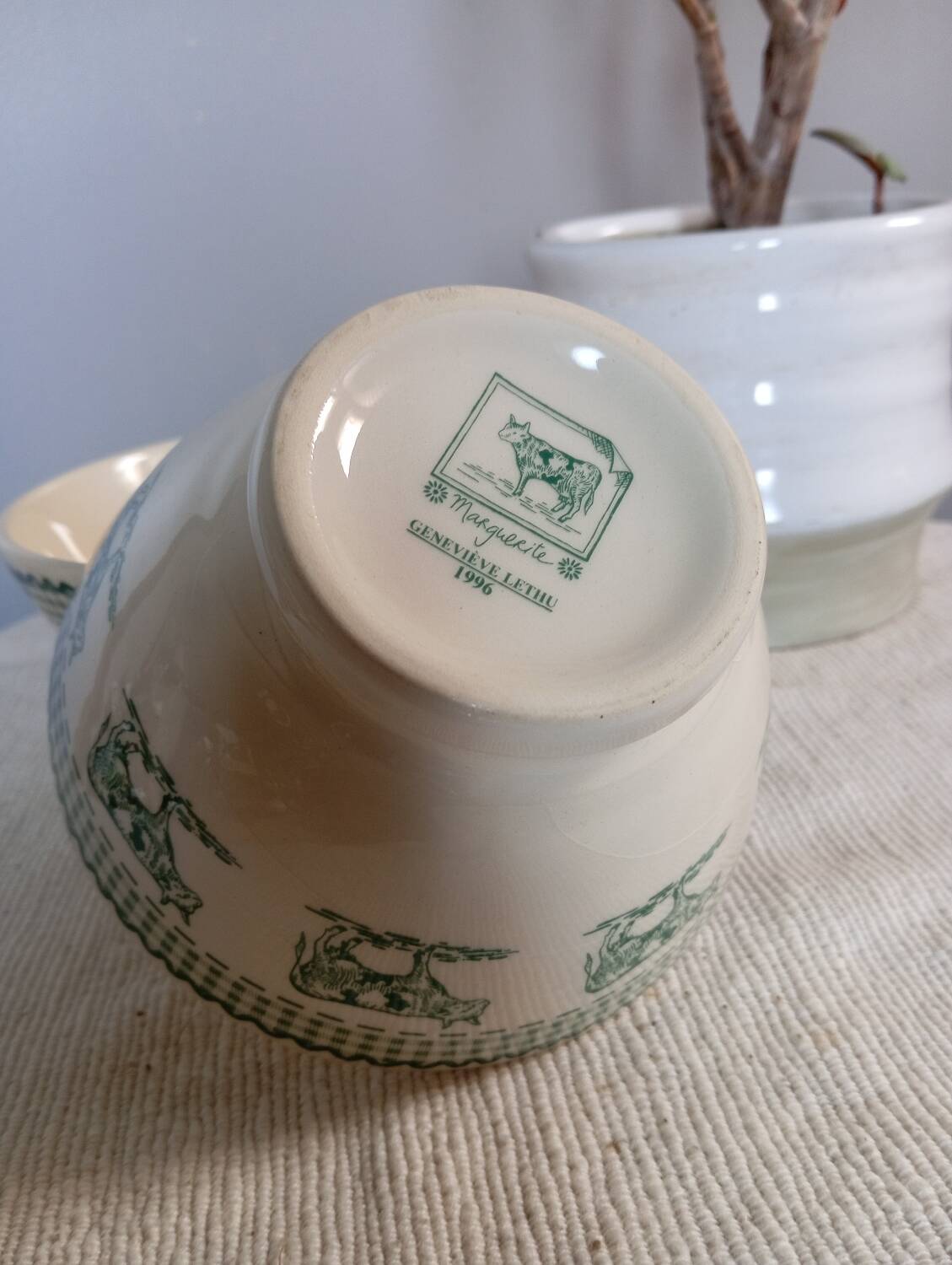 Duo of “daisy” cow decor bowls by Geneviève Lethu, 1996