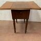 Table de chevet a battant en noyer XX siècle