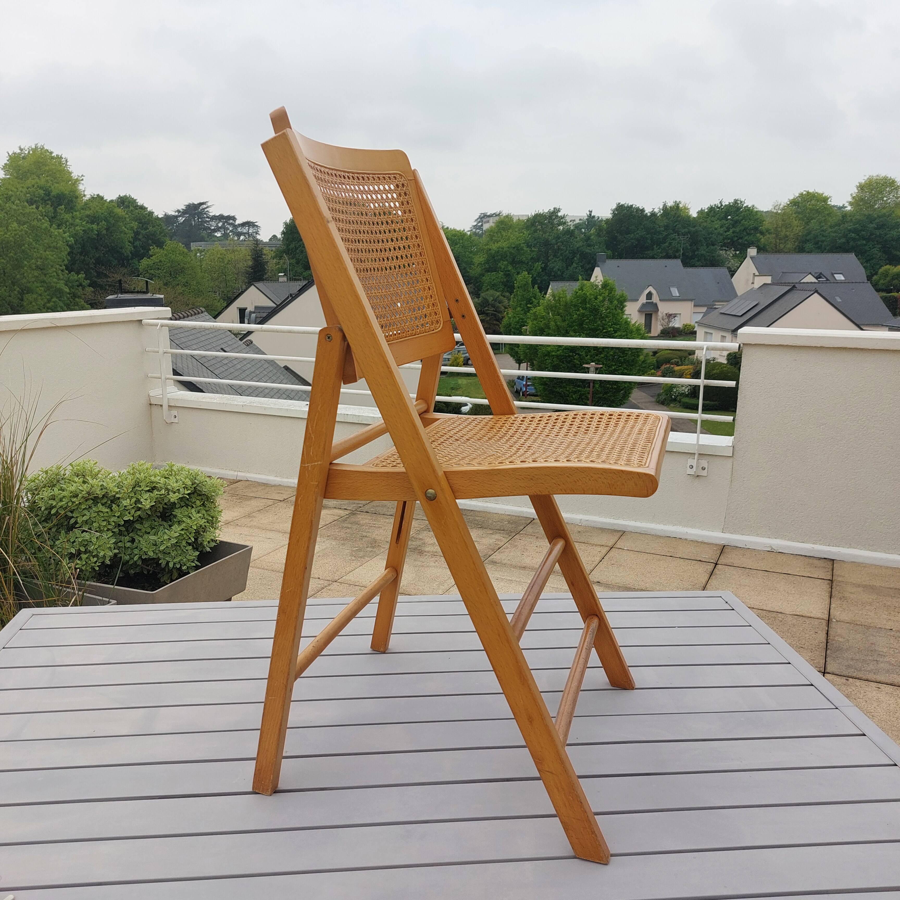 Vintage woven cane folding chair from the 80s