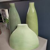 Trio of green enamelled vases