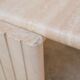 Table basse vintage en travertin par les éditions Roche Bobois