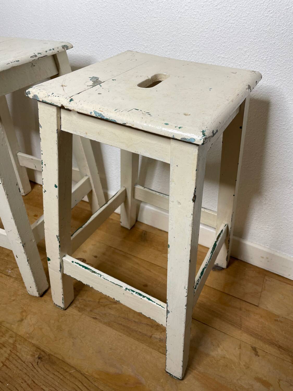 Pair of vintage cream stools in painted wood