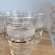 Set of 11 granite glass cups and golden edging