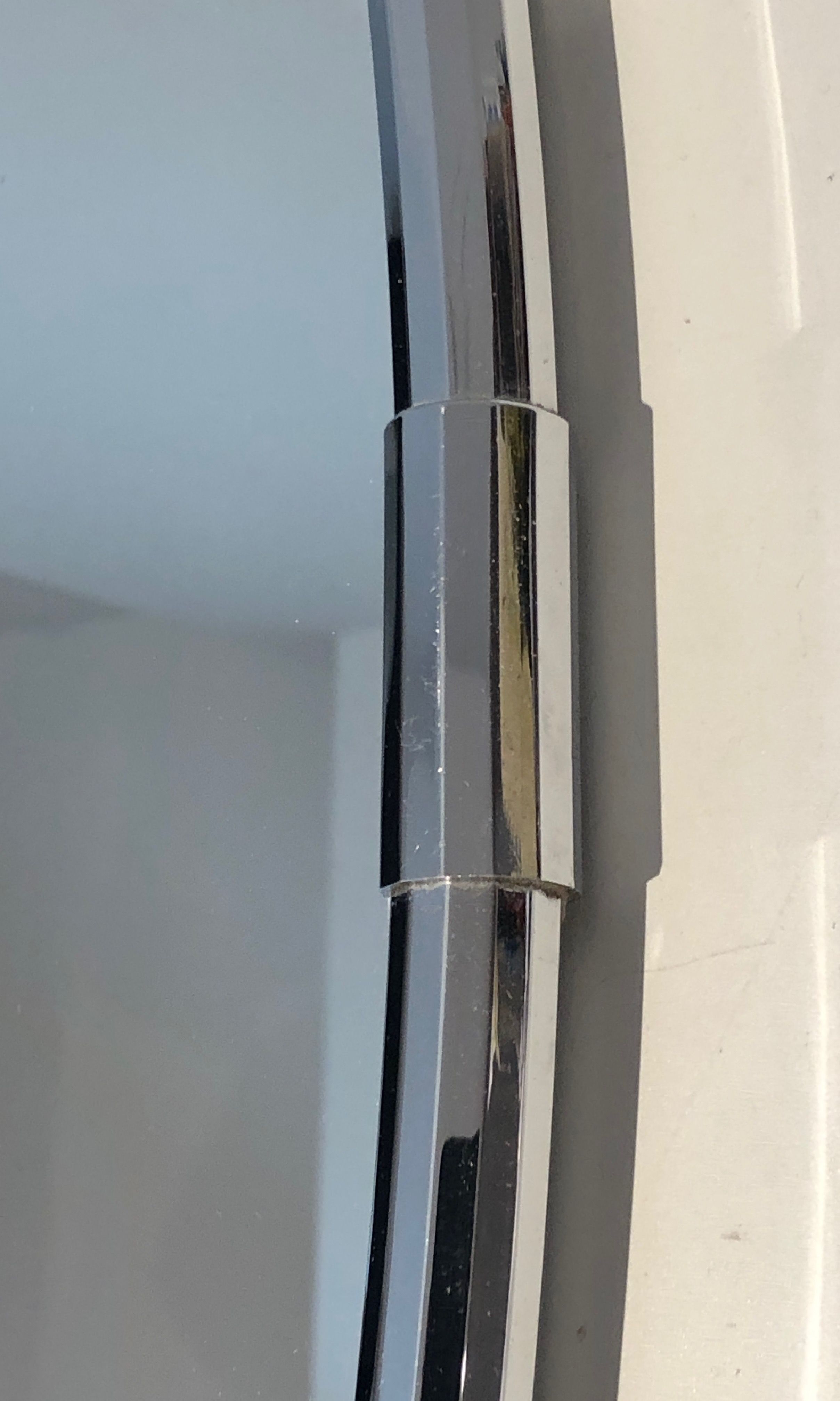 Oval chrome mirror in Art Deco style. Circa 1970.