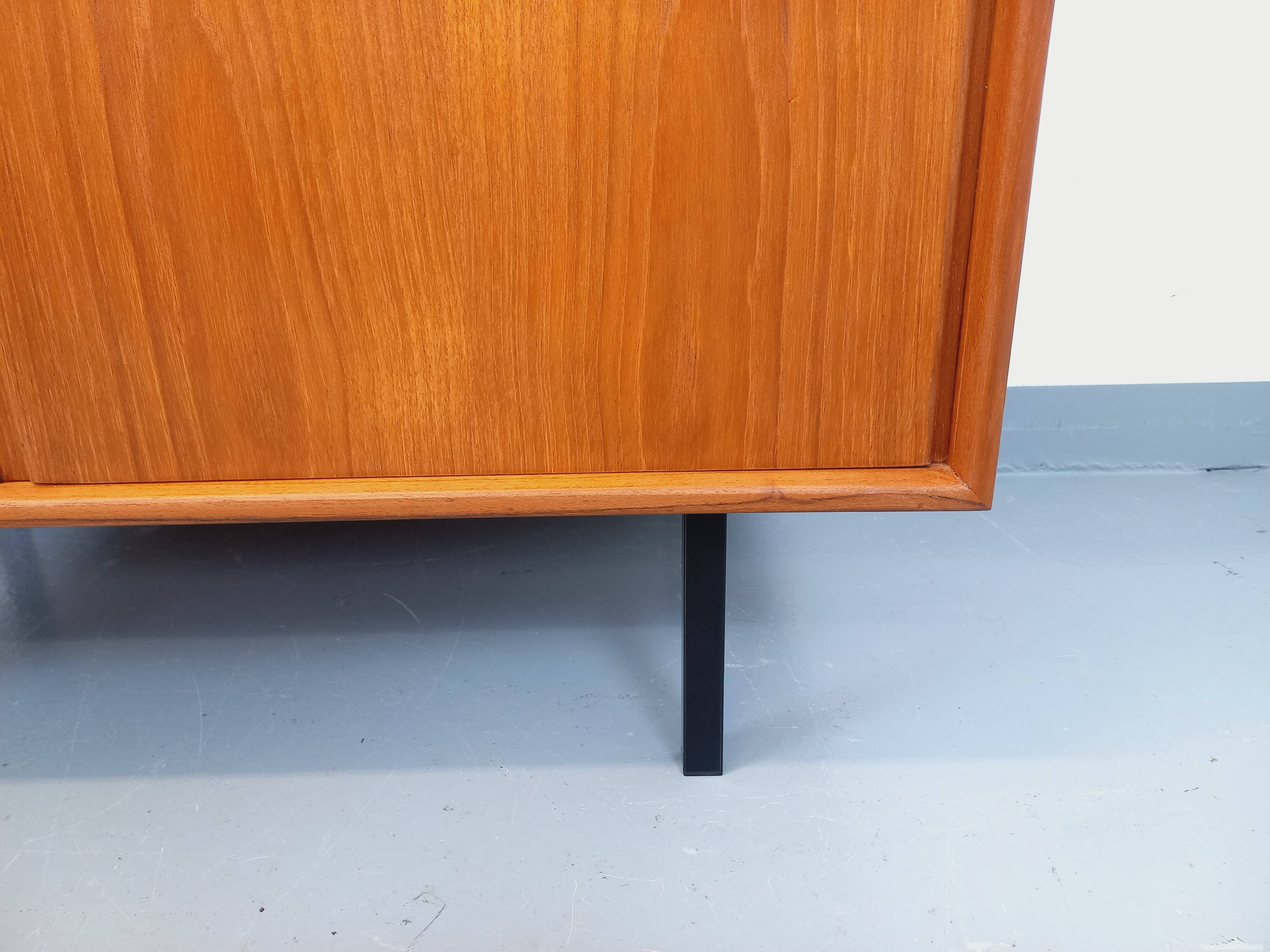 Vintage Scandinavian modernist wardrobe in teak and metal from the 1960s.