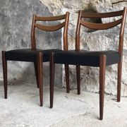 Pair of Scandinavian chairs Ameublement NF black imitation leather and teak - 1960