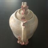 Vintage teapot décor in coral relief