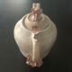 Vintage teapot with relief coral decoration.