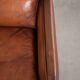 Sheepskin Art Deco design armchair with a comfortable seat and warm colours