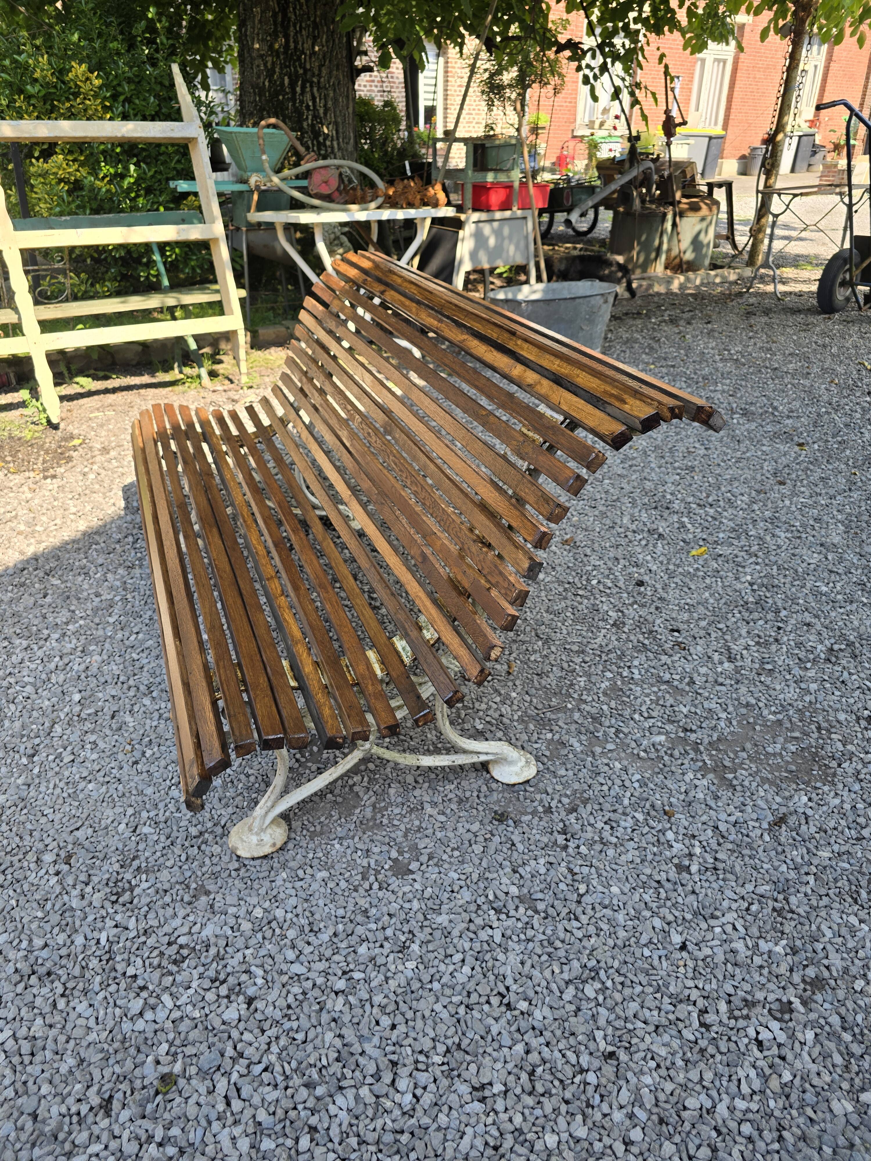Garden bench with cast iron legs and oak slats