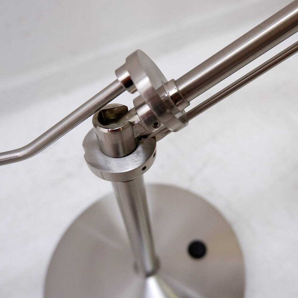 Pair of brushed steel table lamps with adjustable tilt - United Kingdom