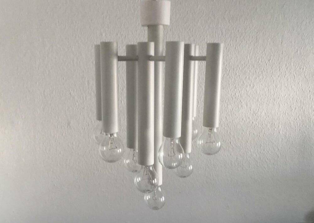 Minimalist suspension from the Swiss space age of the mid-century type 415 by Temde, 1960s.