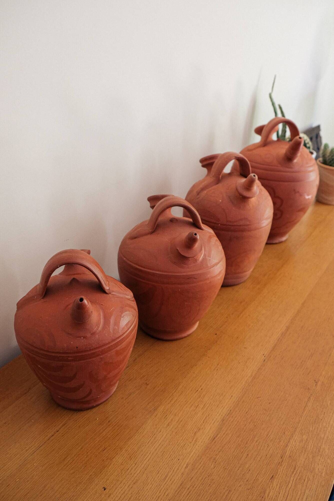 Set of 4 terracotta jugs