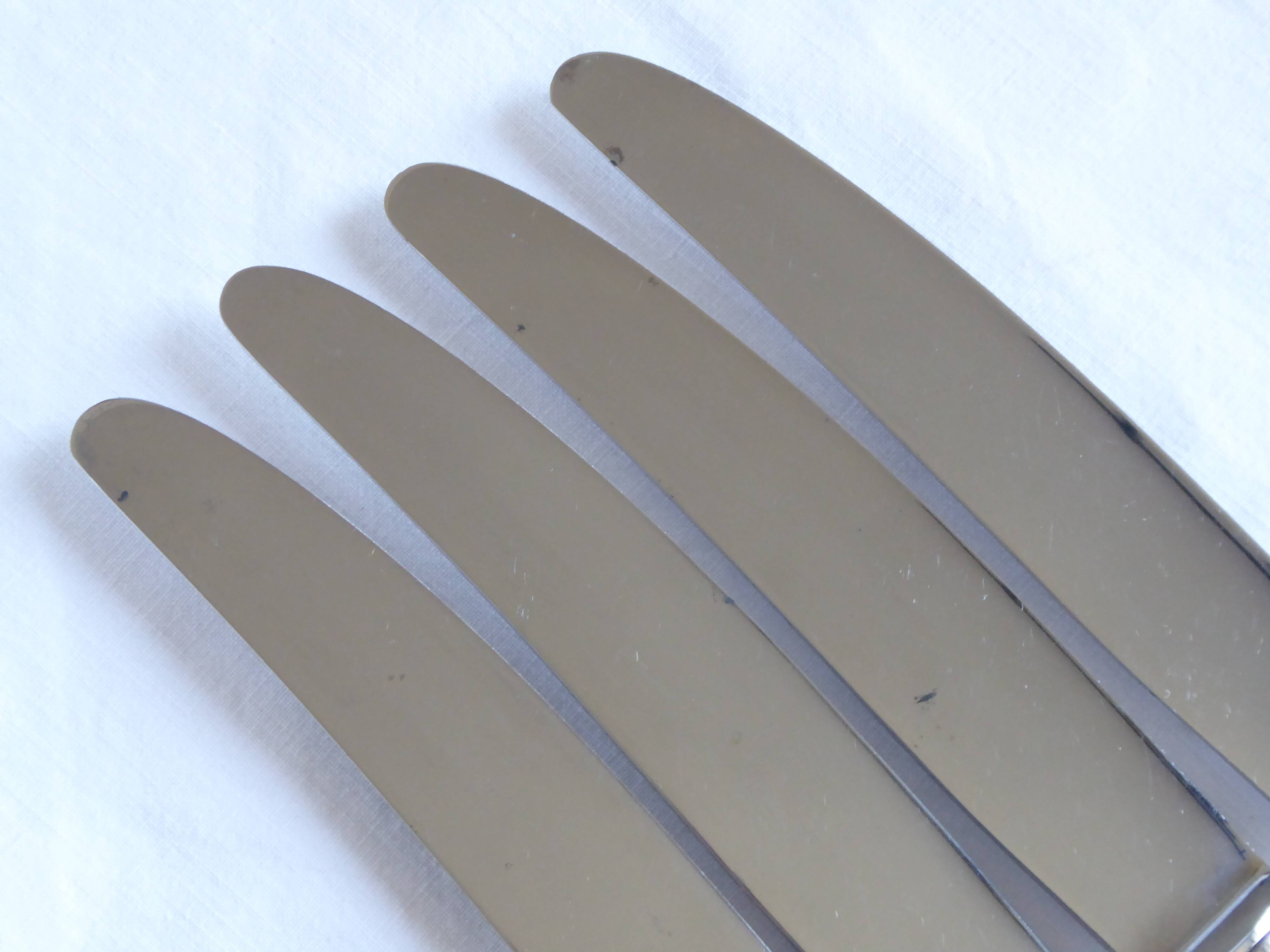 12 couteaux de table métal argenté