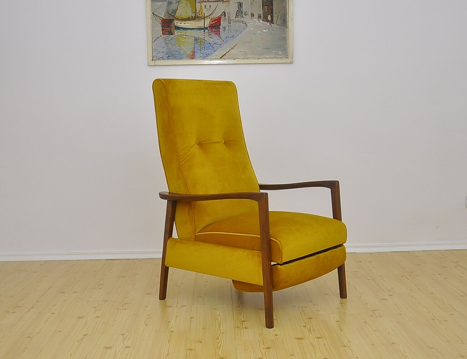 Mid-century armchair with folding footrest, 1960s