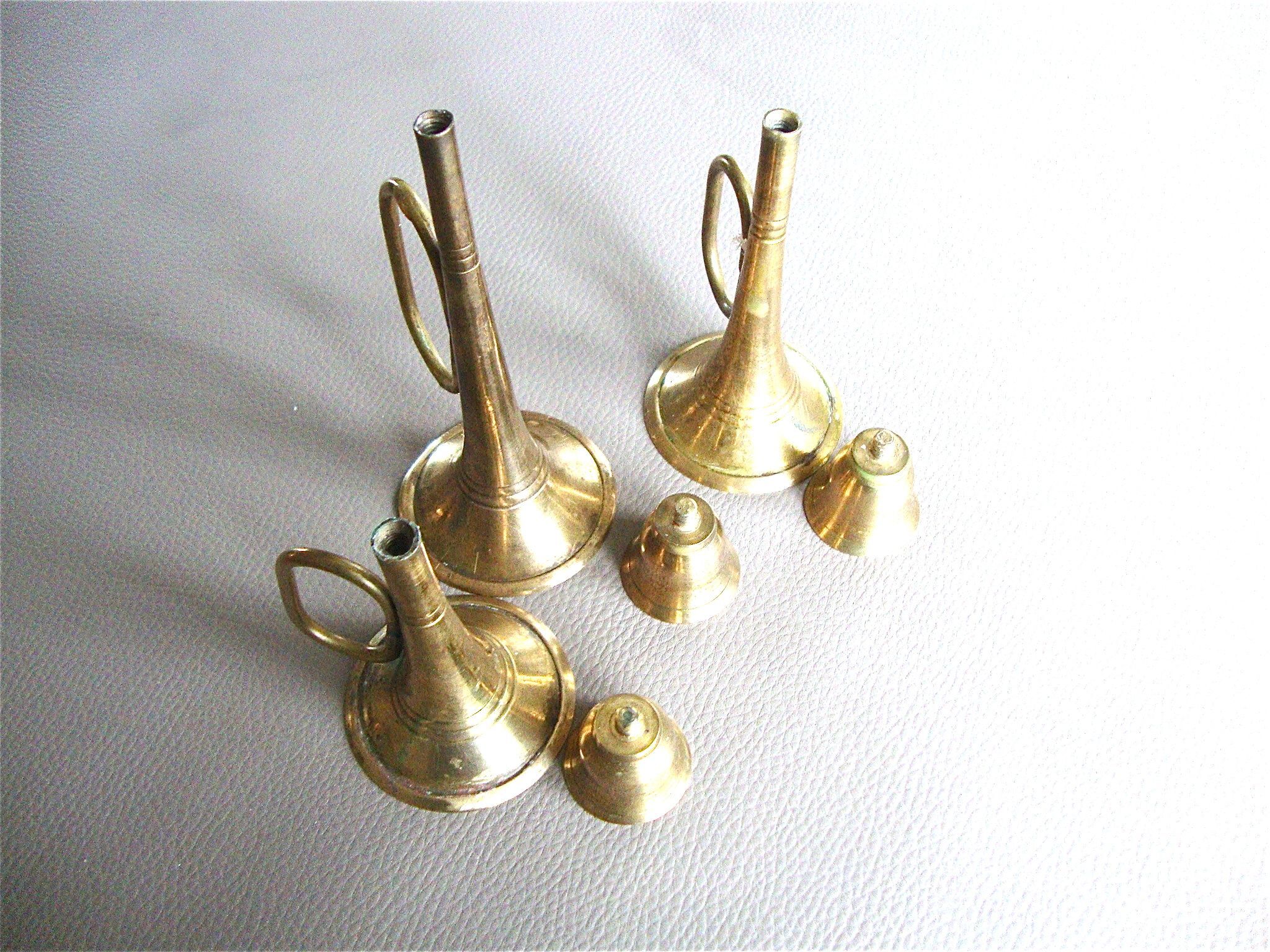 3 brass trumpet candlesticks