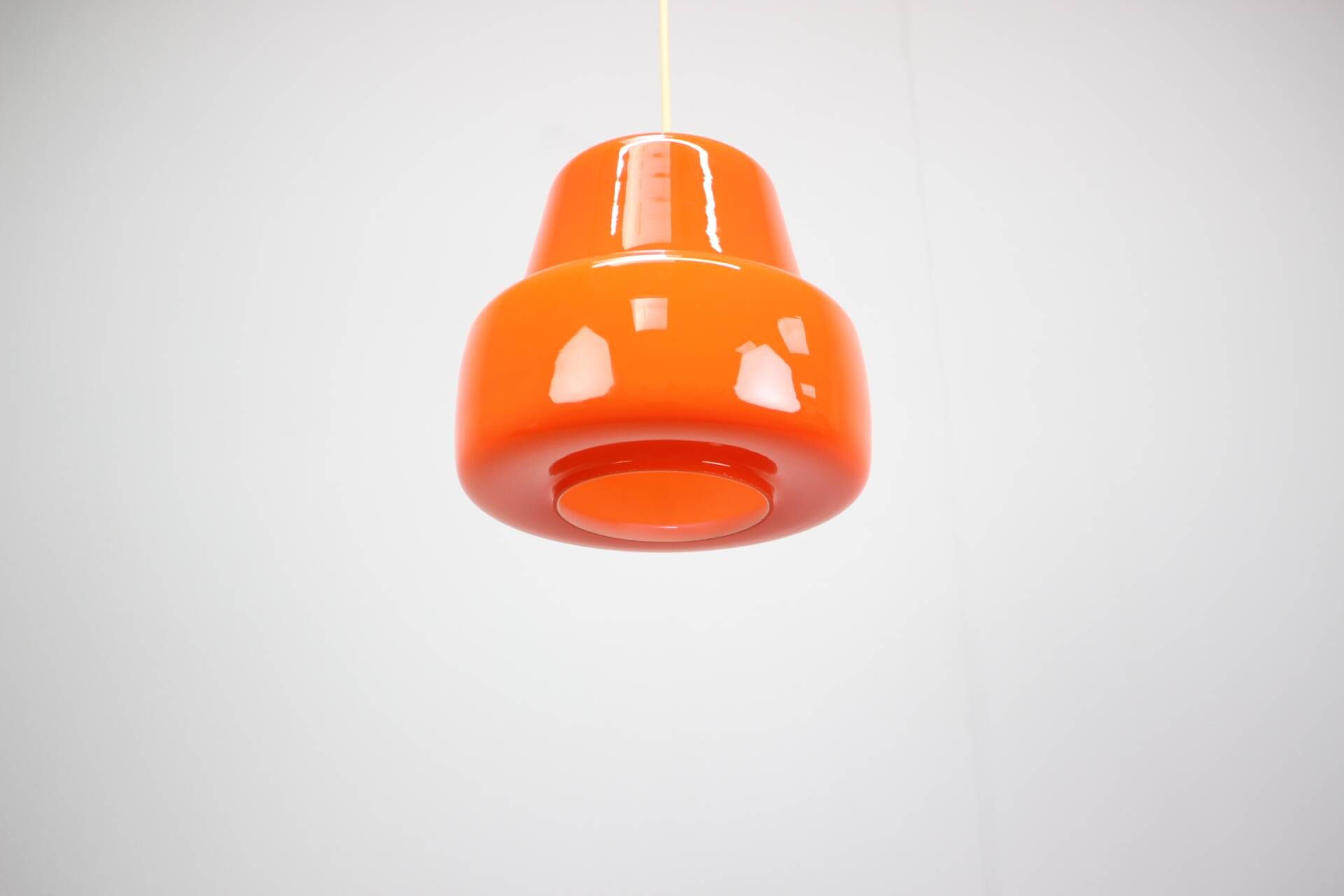 Vintage orange glass pendant lamp, Czechoslovakia, circa 1970.