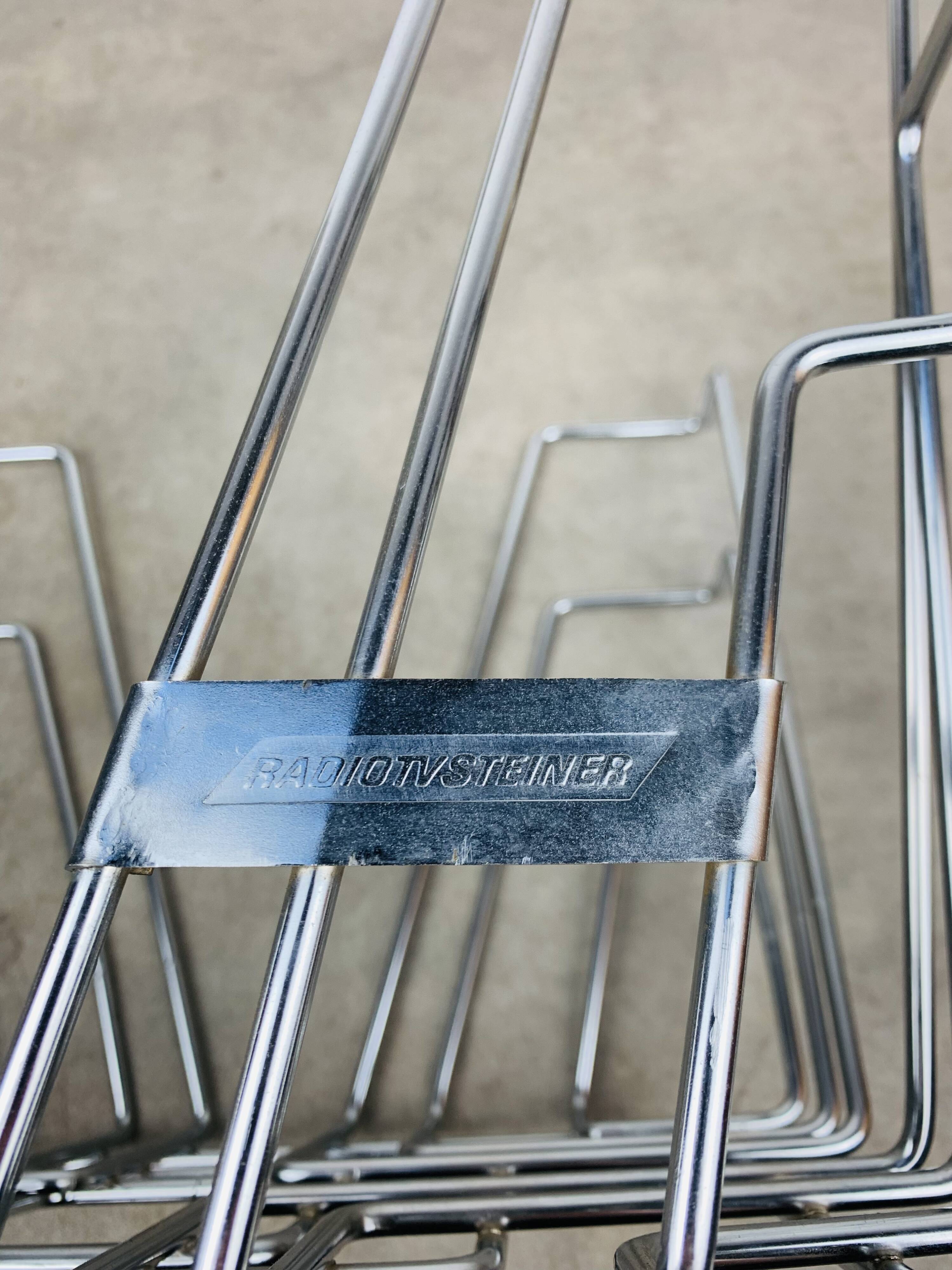 Chrome metal magazine rack or vinyl holder from the 70s.