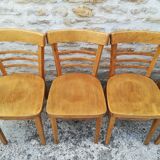 12 varnished bistro chairs