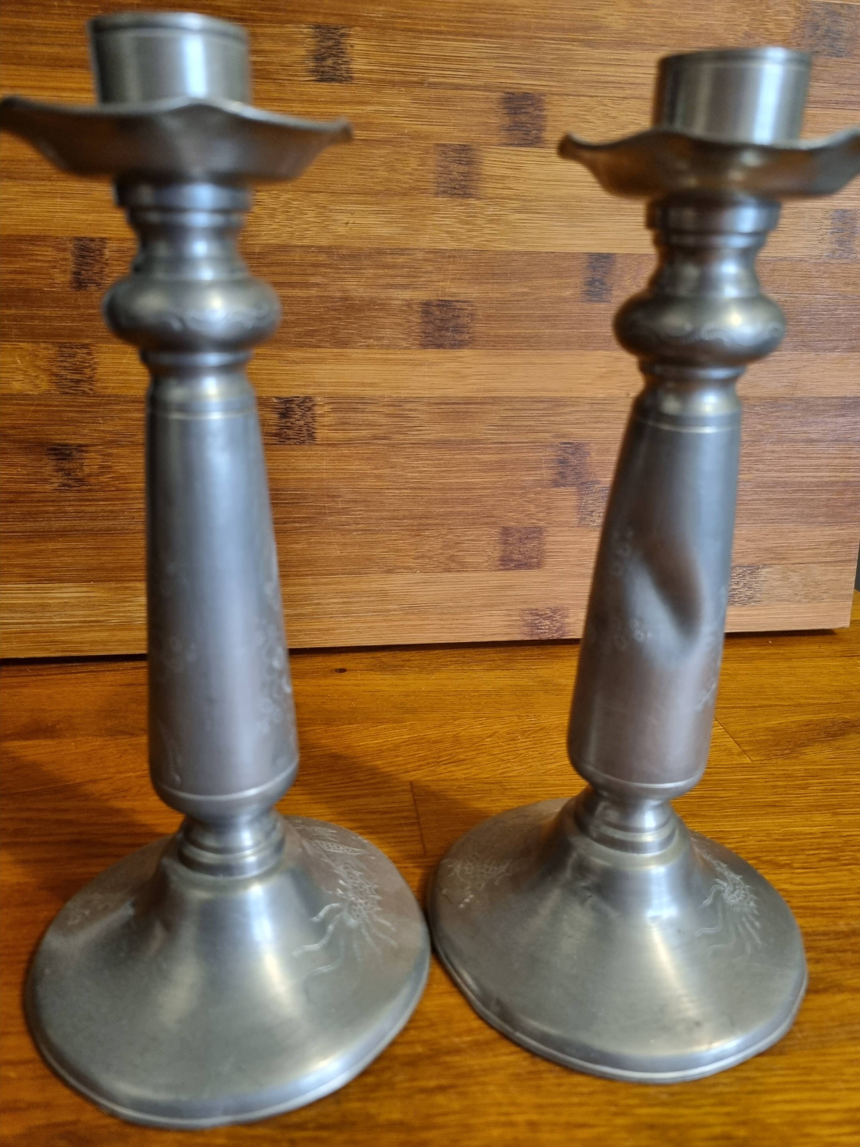 Pair of old Chinese candlesticks in engraved pewter