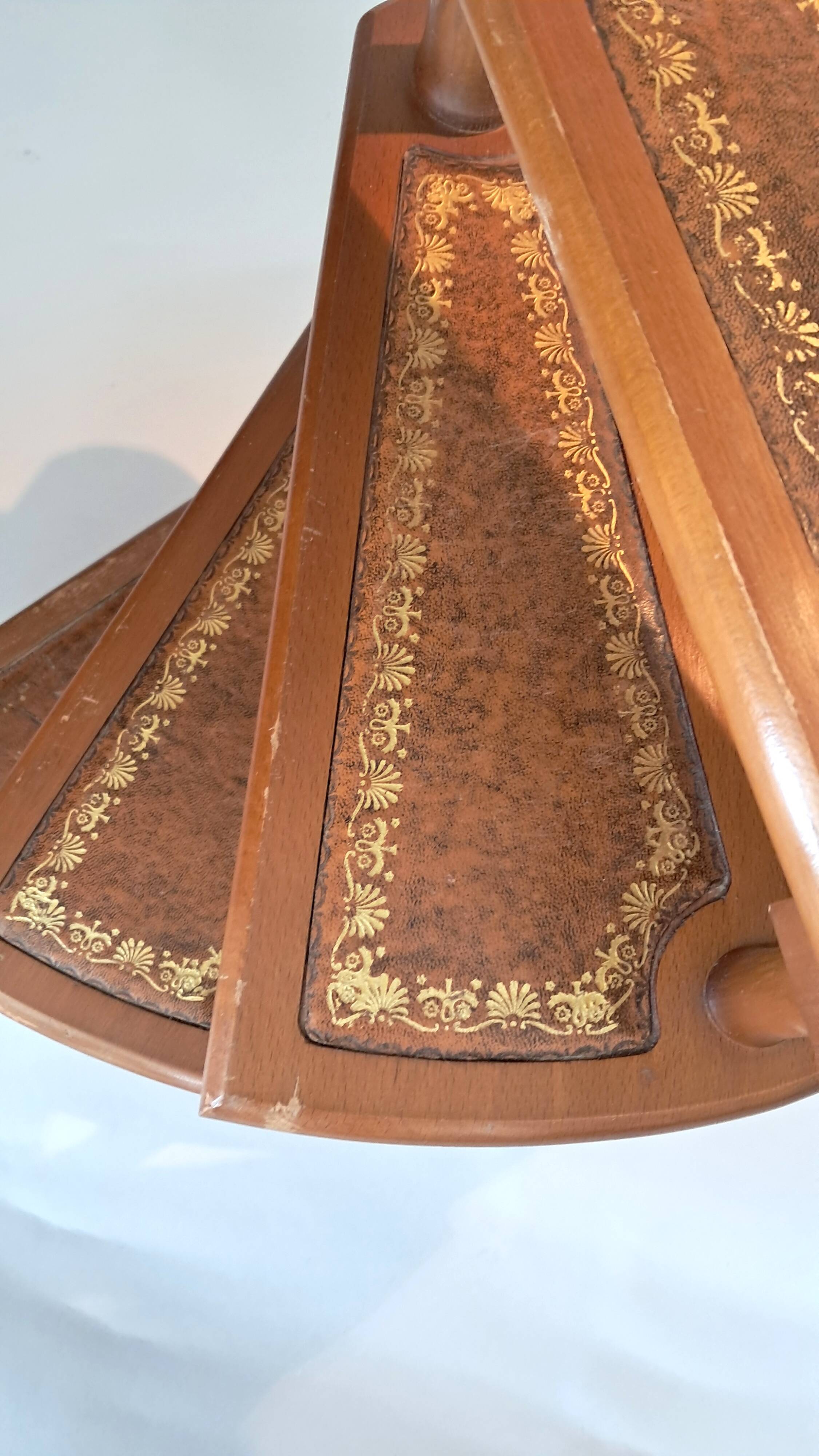 Library spiral staircase in beech and brown leather.