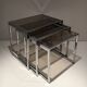 Suite de 3 tables gigognes chromées. Vers 1970