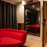 Ligne Roset “Yang” sofa, in red Kvadrat “Divina” fabric