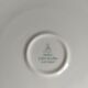 White Limoges porcelain tableware with gold trim.