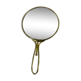 Old mirror double face with golden hand
