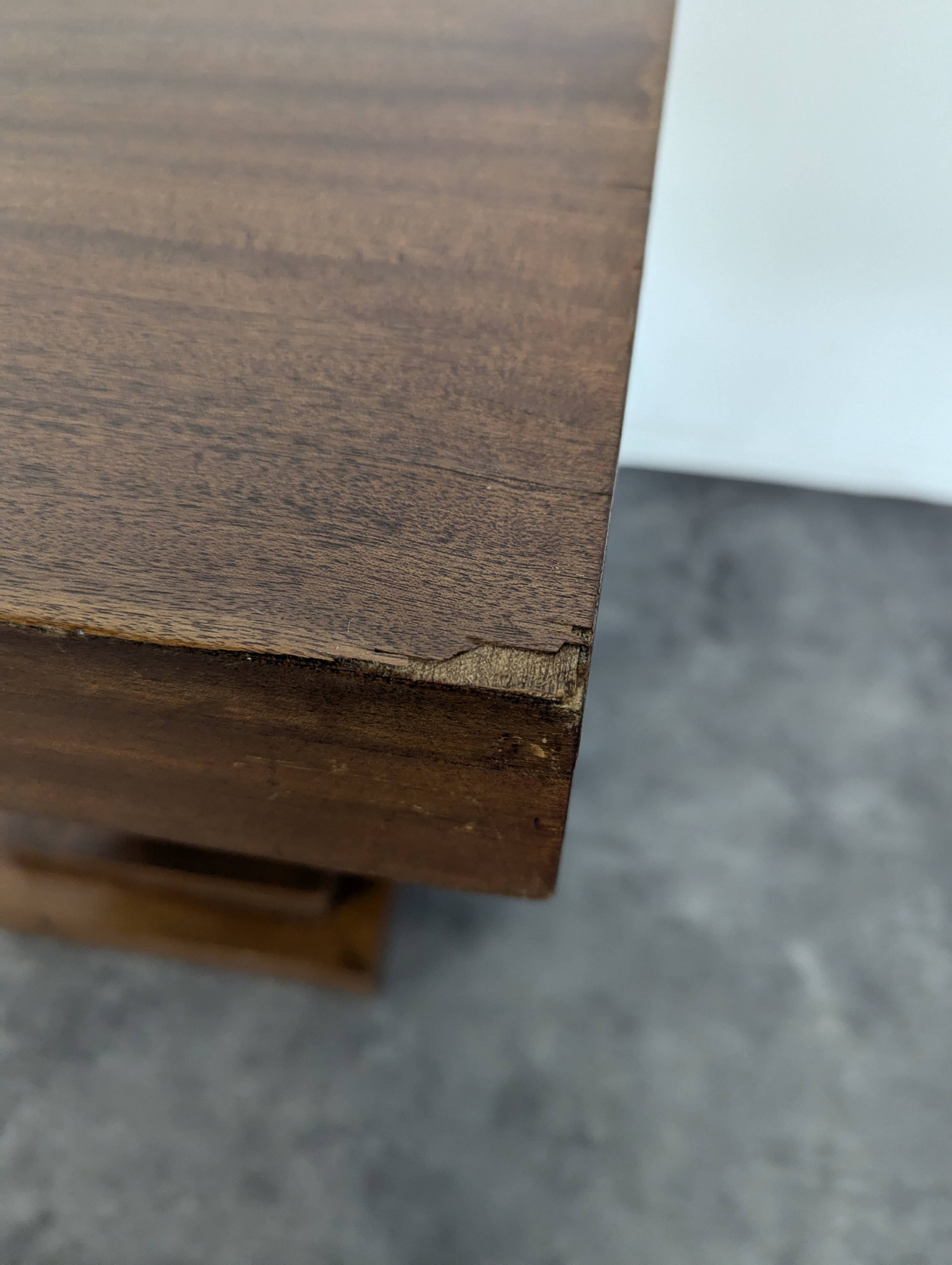 Modernist side table in mahogany veneer.