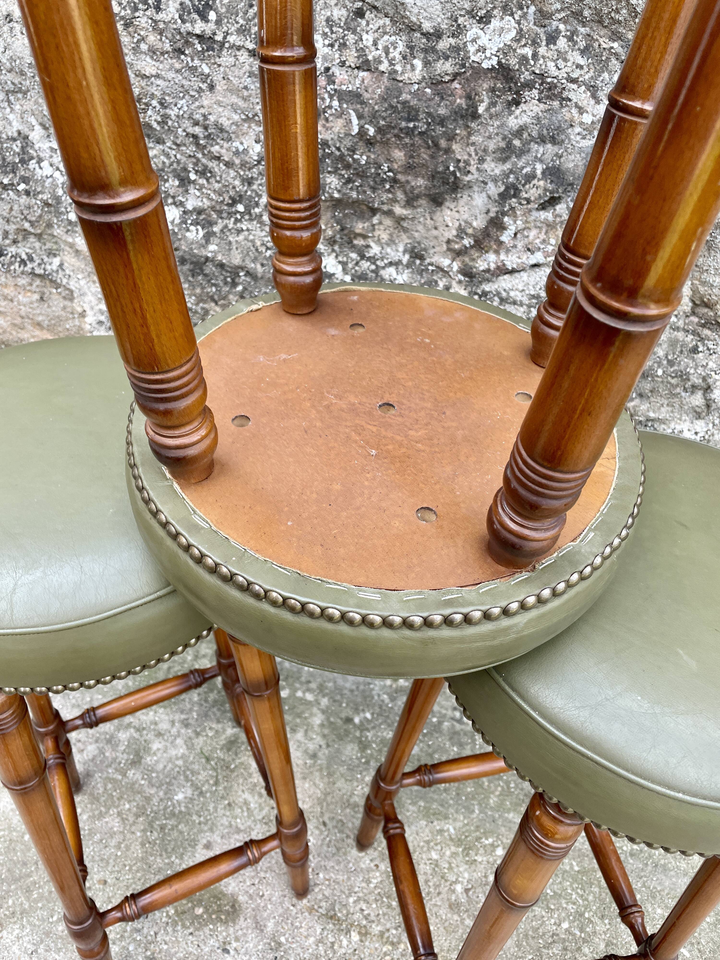 Trio of leather bar stools