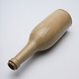 bottle in glazed and cracked sandstone