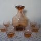 Pink glass liqueur carafe and 6 matching glasses