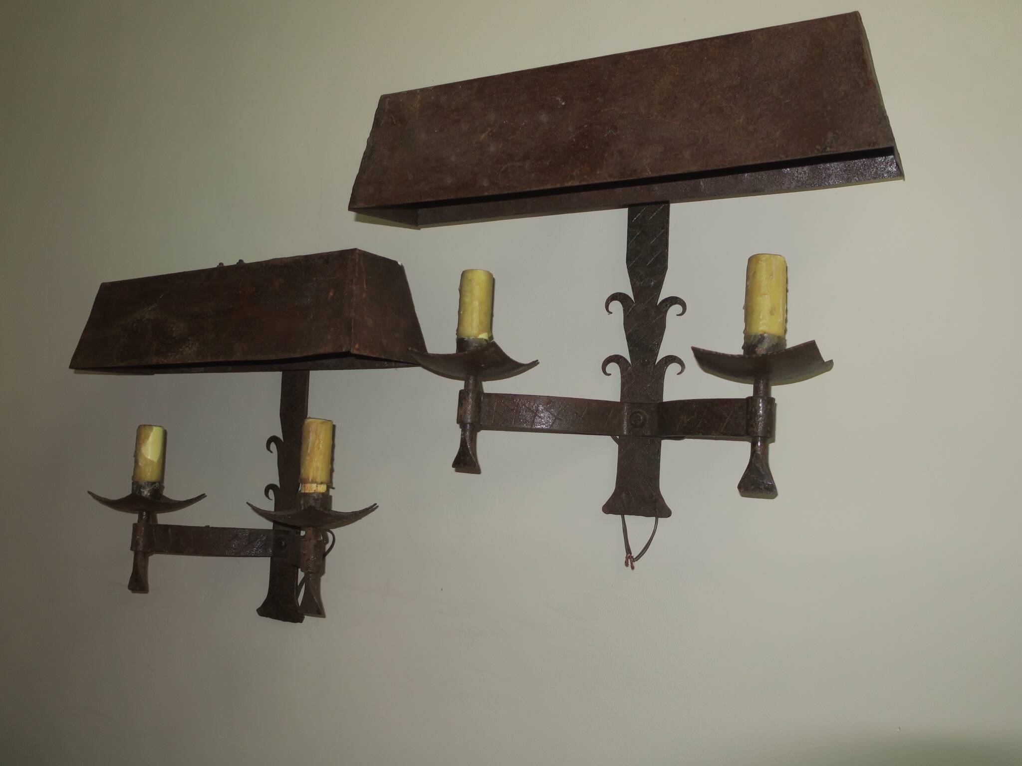 Pair of mid century Brutalist patinated iron wall lights, 1950s-60s