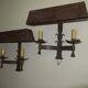 Pair of mid century Brutalist patinated iron wall lights, 1950s-60s