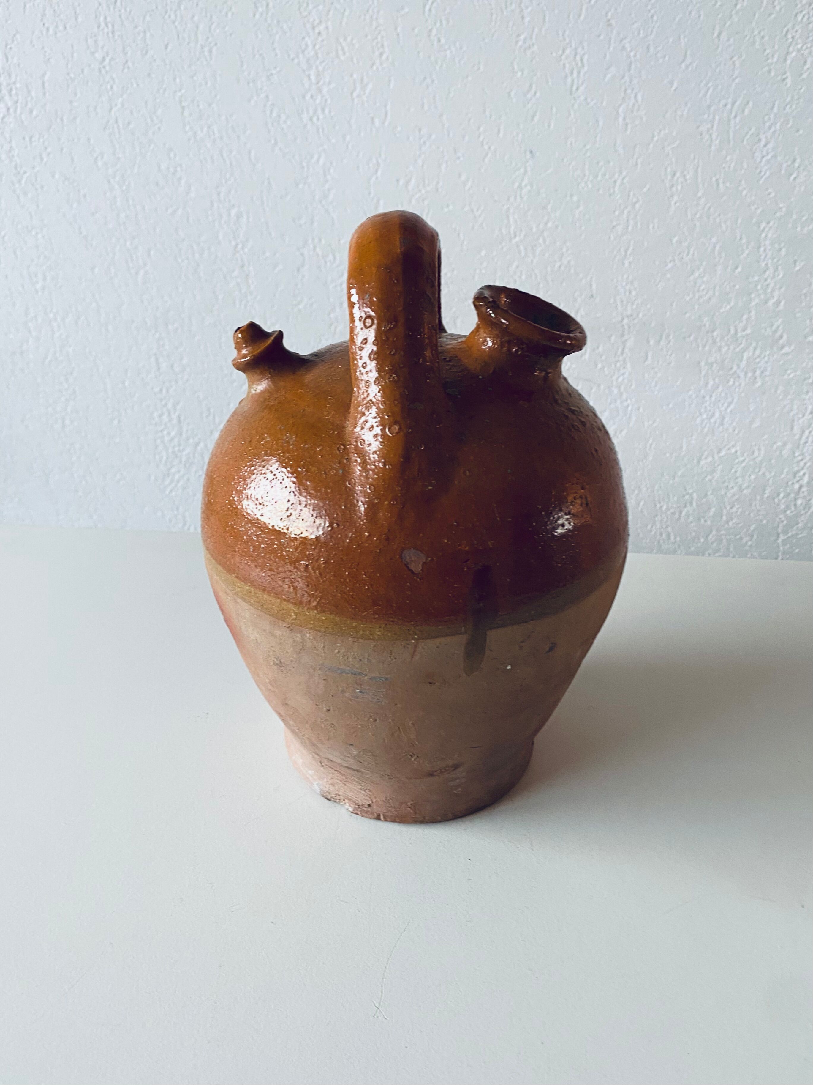 Old bohemian pottery, terracotta jug
