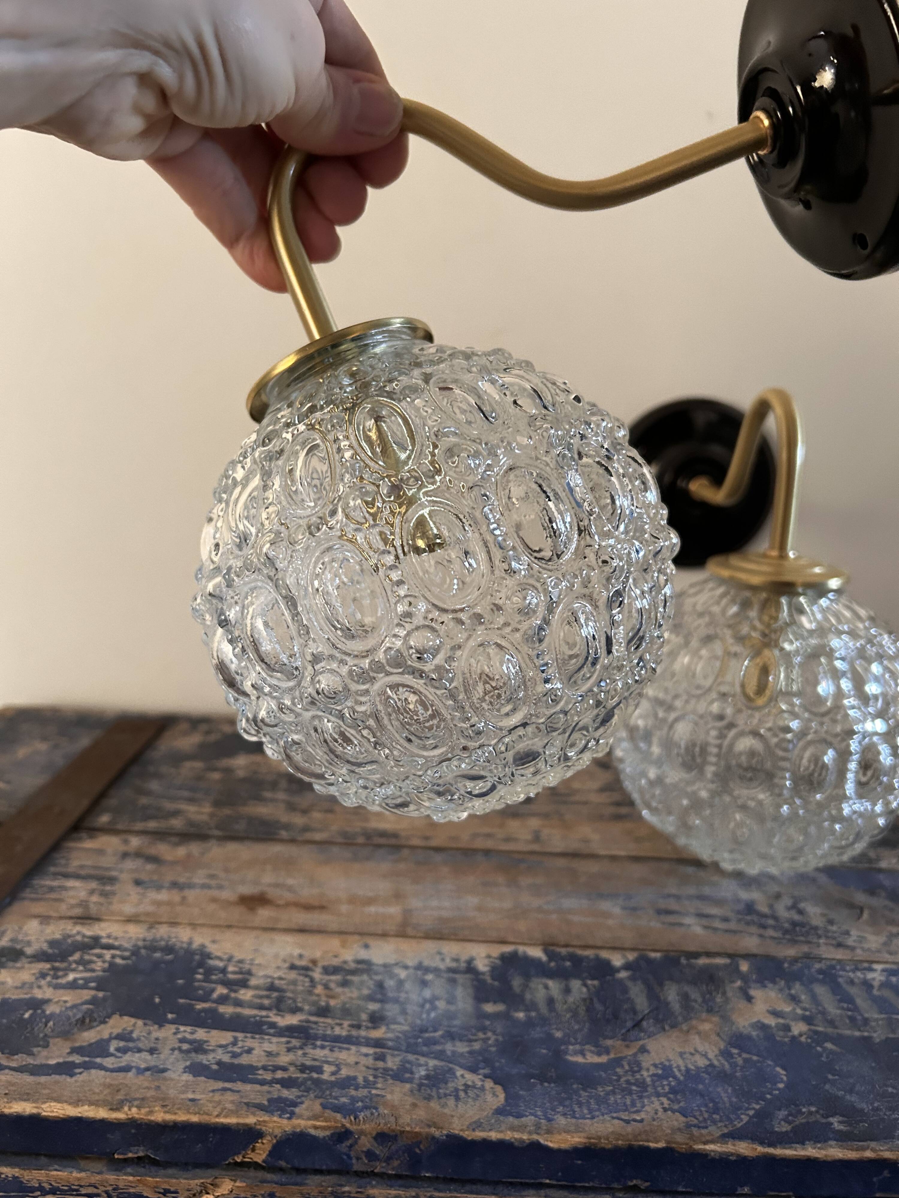 Pair of globe wall lights
