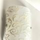 Polished and screen-printed glass sconce by eglo
