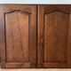 Set of chest of drawers and tall antique furniture in dark oak.