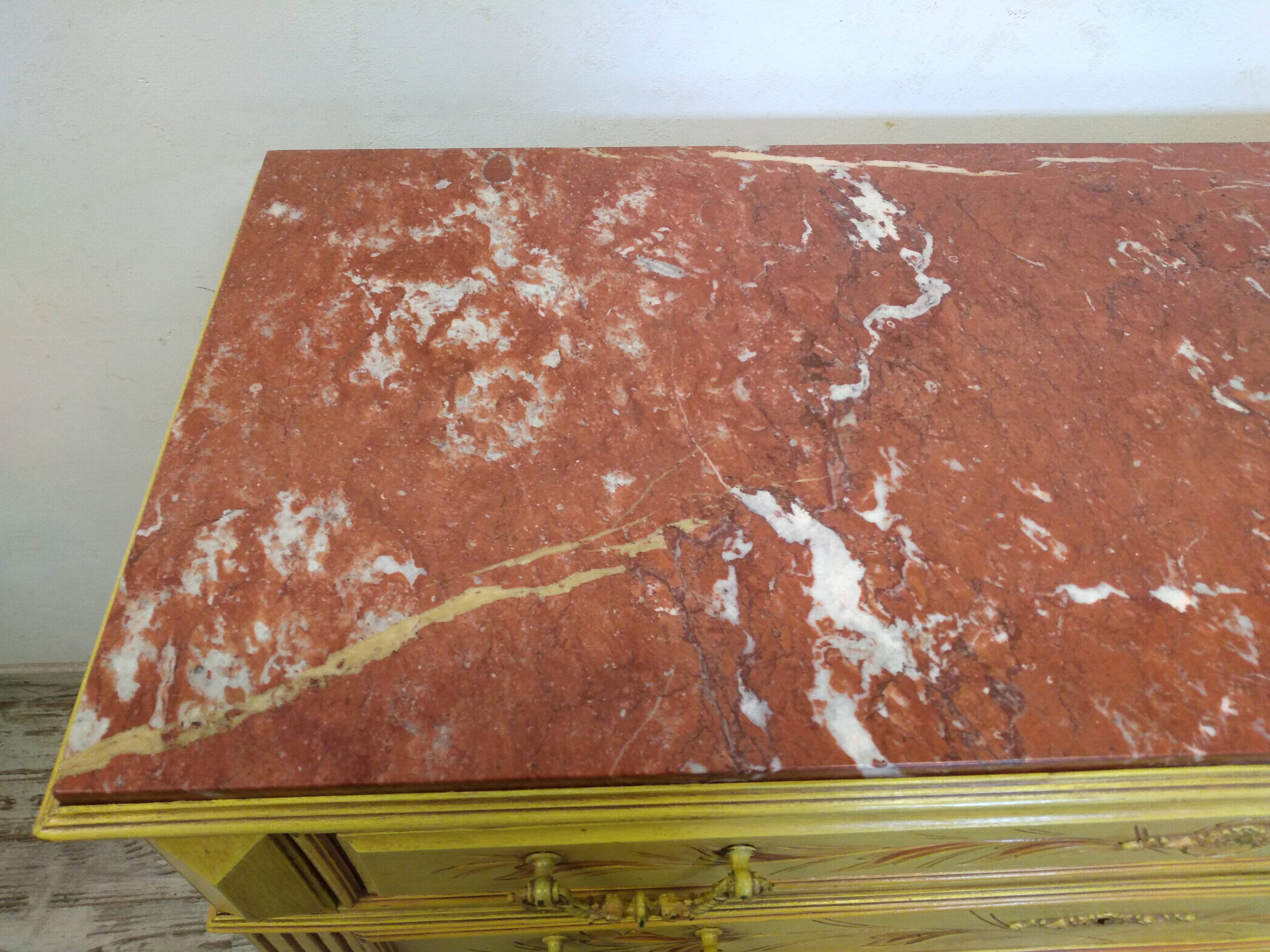 Antique chest of drawers with marble