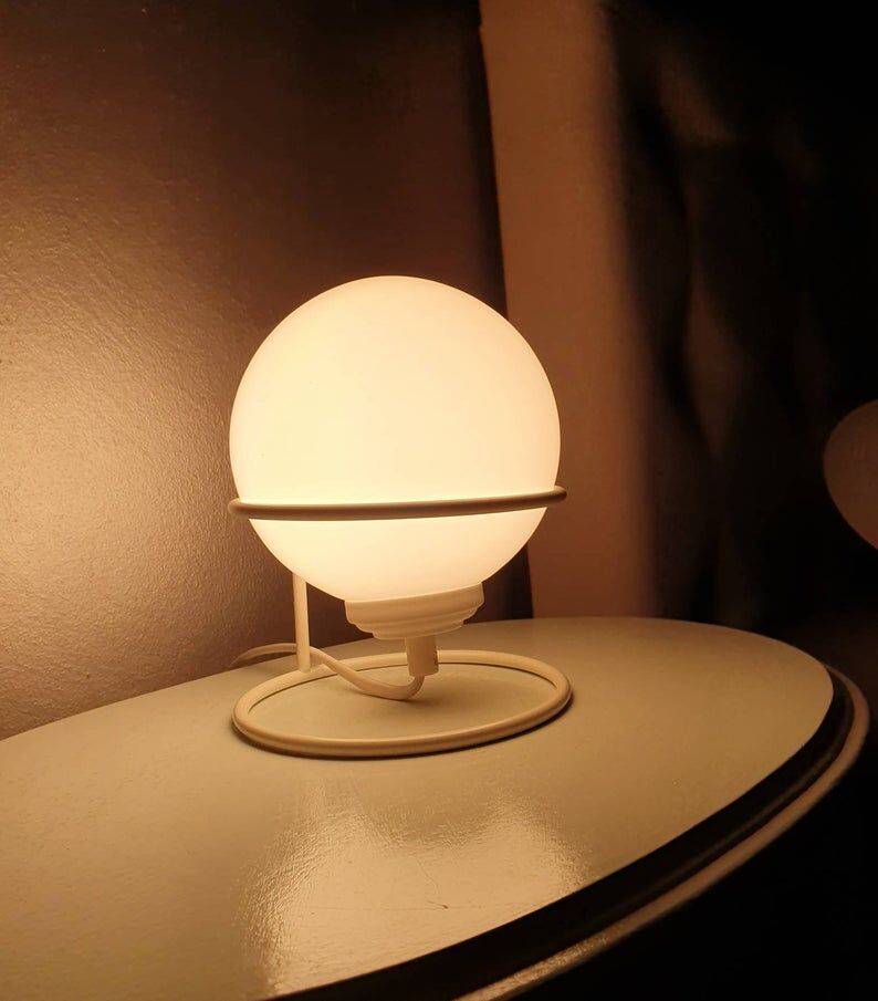 Vintage light bulb lamp on metal support 1980