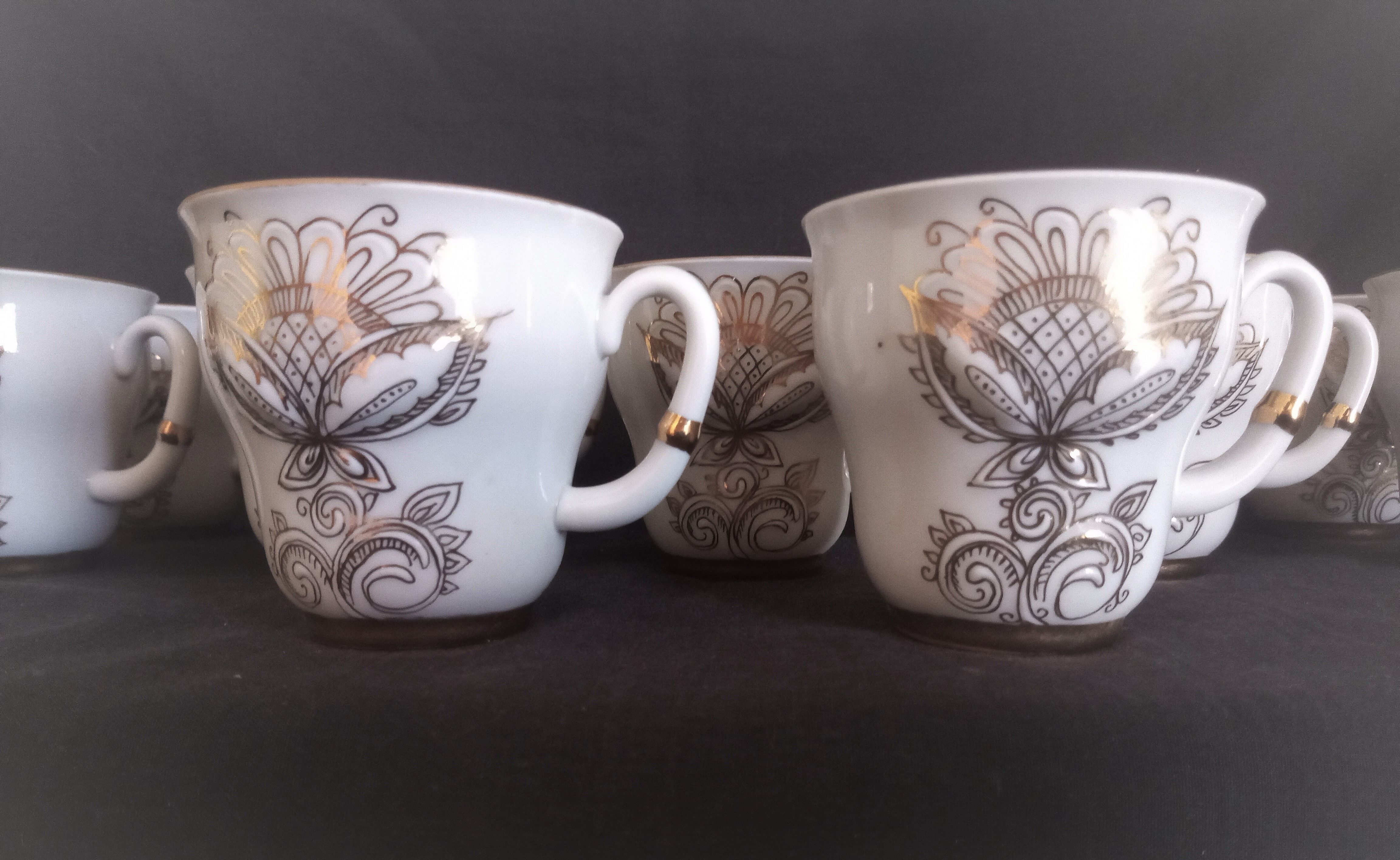 Lomonosov 29-piece porcelain coffee set, cast patterns enhanced with 24k gold