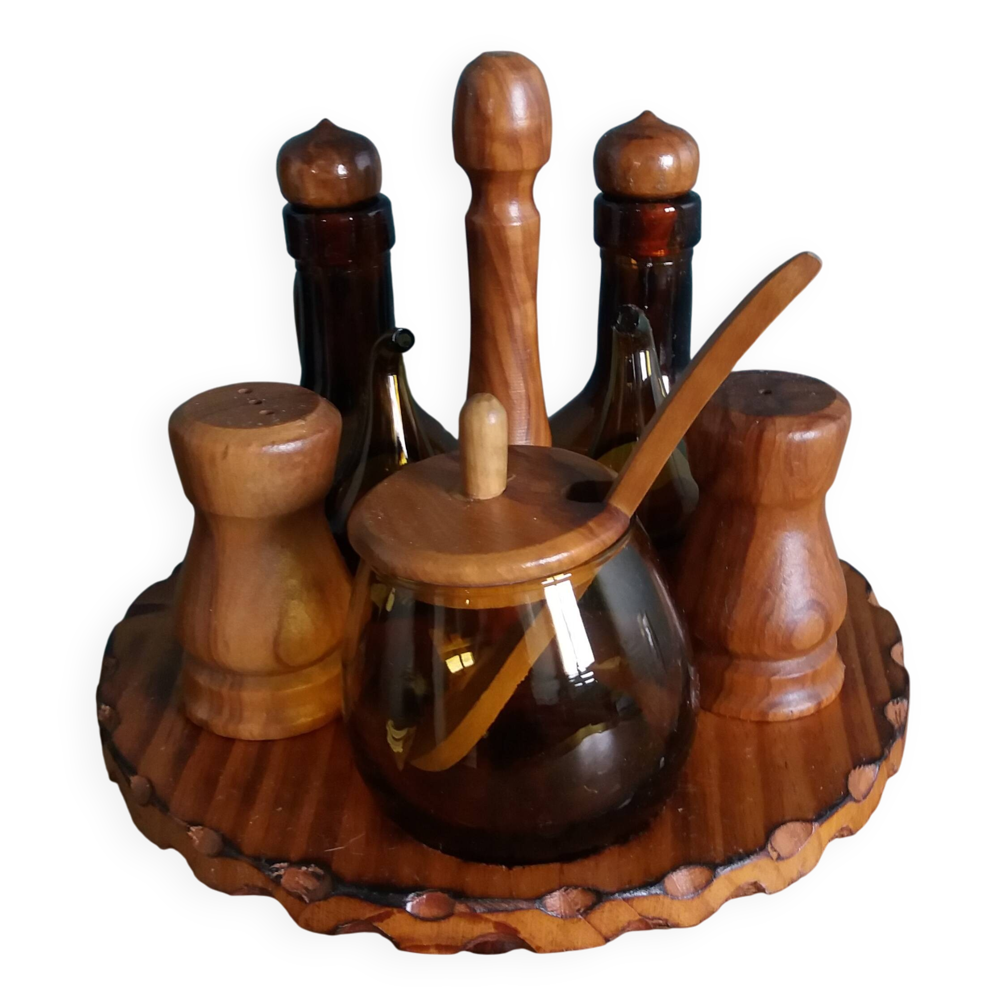 Oil, vinegar, mustard, pepper, salt, olive wood servant from Spain.