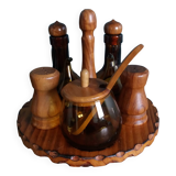 Oil, vinegar, mustard, pepper, salt, olive wood servant from Spain.