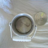 Old aluminum milk pot