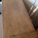 Buffet made of natural wood and bronze green.