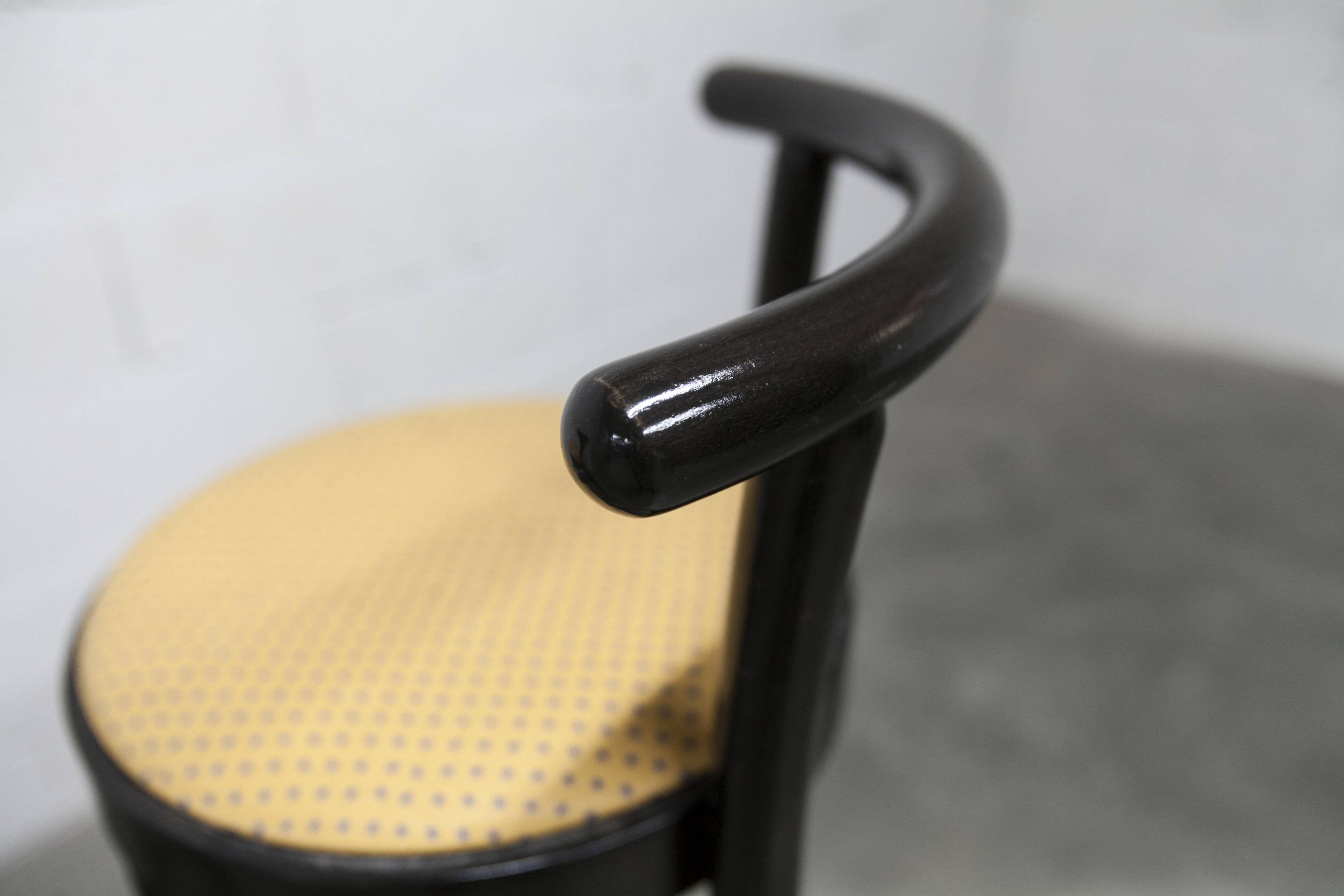 Pair of Baumann Dialog model stools in black and yellow and blue imitation leather, 1990